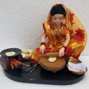 Doll Of Woman Making Rotis on A Chula