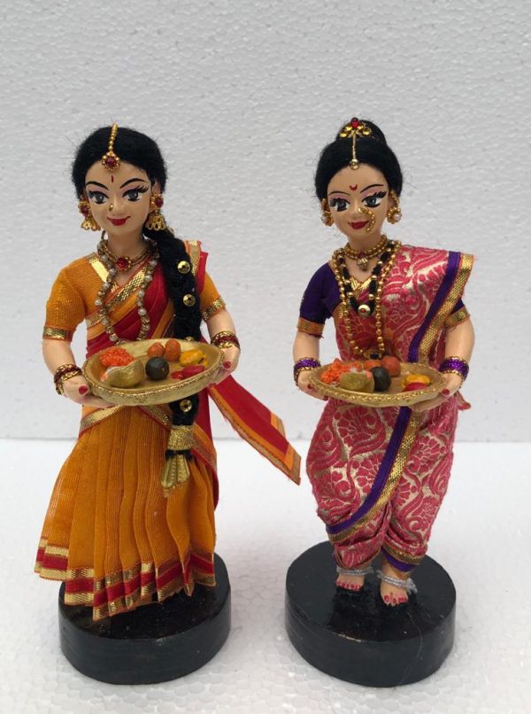 Girl and women holding vayanam-2